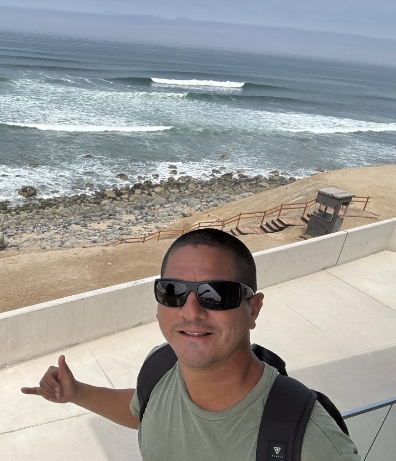Antonio, founder and host of Peru Surf Tours, overlooking the Pacific Ocean